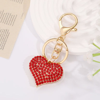 Llavero con colgante de corazón de diamantes de imitación para mujer