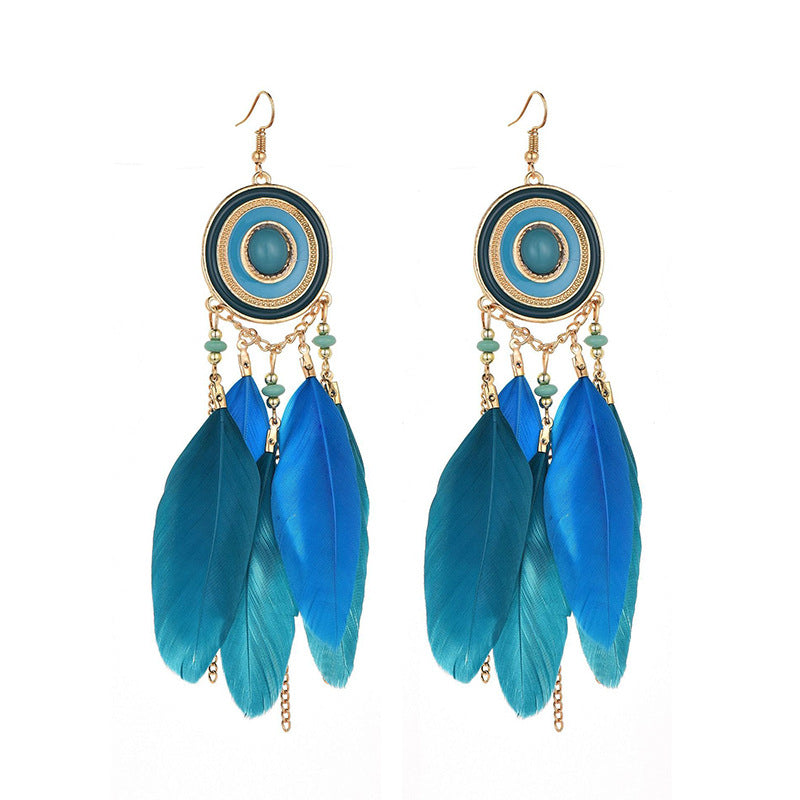 Pendientes bohemios con borlas de plumas exageradas