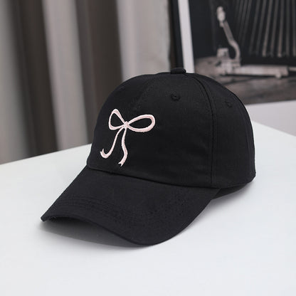 Gorra de béisbol con lazo bordado de color liso para mujer