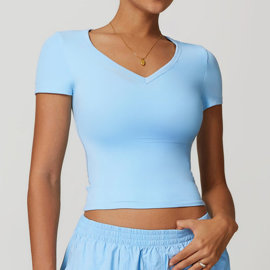 Camiseta de yoga informal de color liso con cuello en V para mujer