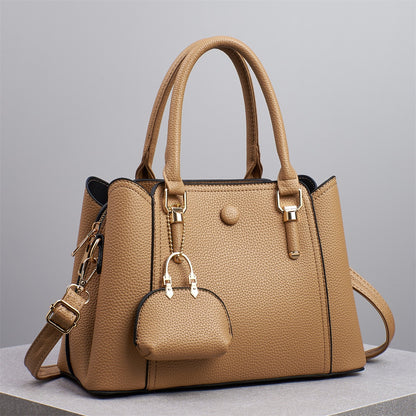 Bolso de mano informal de gran capacidad y color liso para mujer, con cierre de cremallera.