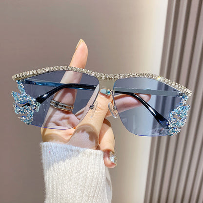Gafas de sol sin montura con diamantes de imitación de metal irregulares de moda con un estilo único