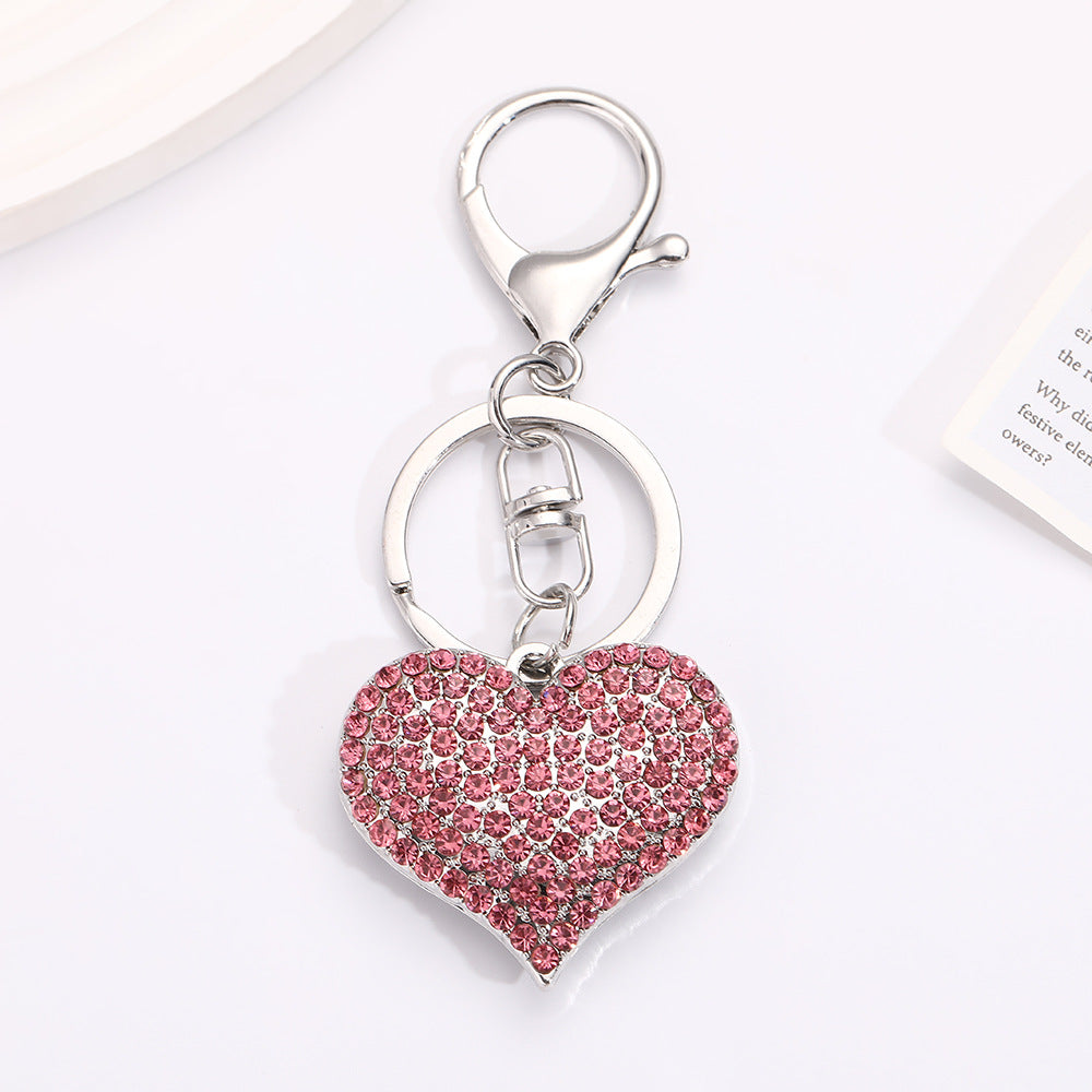 Llavero con colgante de corazón de diamantes de imitación para mujer