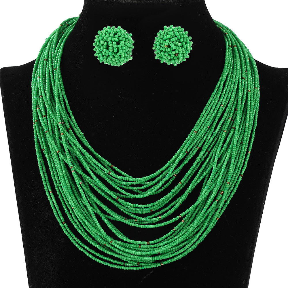 Conjunto de collar y pendientes con cuentas de arroz multicapa estilo bohemio para mujer