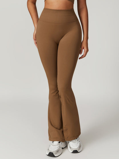 Pantalones deportivos acampanados de color liso de moda de yoga para mujer