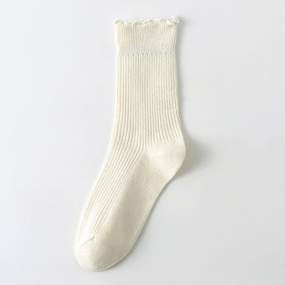 Calcetines casuales de algodón con borde rizado para mujer en colores lisos