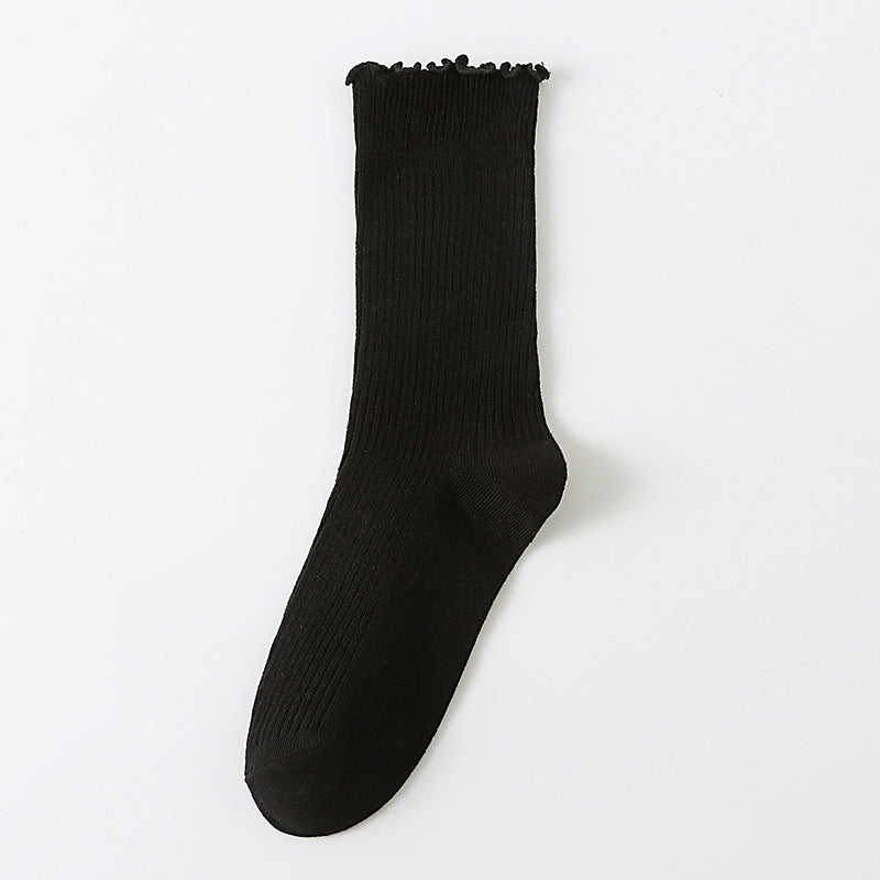 Calcetines casuales de algodón con borde rizado para mujer en colores lisos