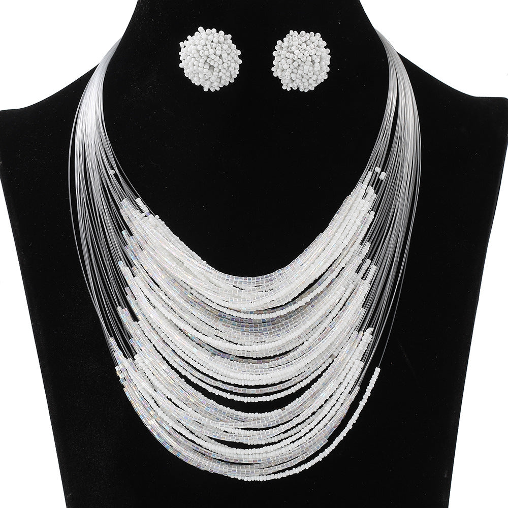 Conjunto de collar y pendientes con cuentas de arroz multicapa estilo bohemio para mujer