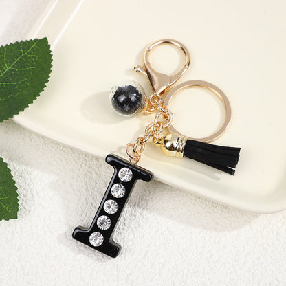 Llavero de resina negra con letras de diamantes de imitación, accesorio de arte moderno