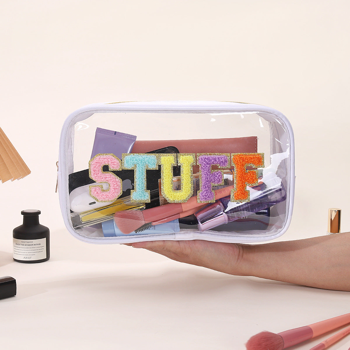 Bolsa de cosméticos impermeable de PVC transparente con letras bordadas
