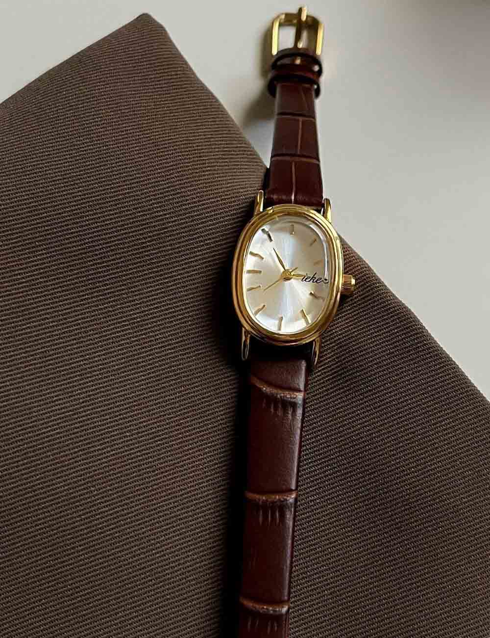 Elegant Small Oval Dial Leather Strap Quartz Watch