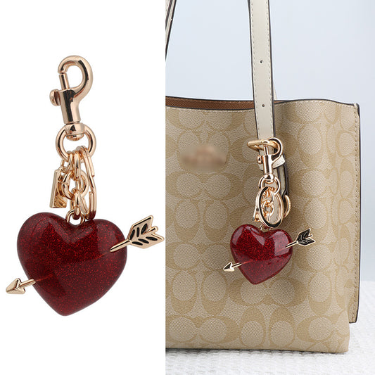 Llavero con colgante de bolso rojo de resina estilo urbano para mujer