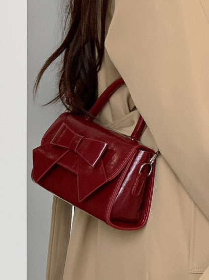 Bolso de mano pequeño cuadrado con lazo de color liso elegante para mujer