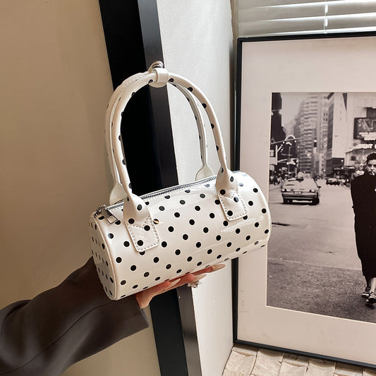 Bolso de hombro cilíndrico portátil con punta ondulada de moda