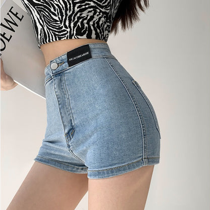 Pantalones cortos vaqueros de cintura alta de color liso sexys a la moda para mujer
