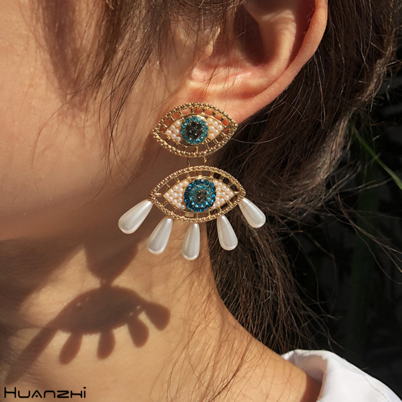 Pendientes de ojo de diablo con perlas de imitación de diamantes de imitación para mujer