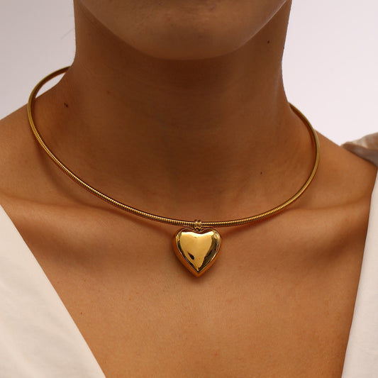 Collar circular sencillo de acero y titanio con forma de corazón de 18 quilates para mujer