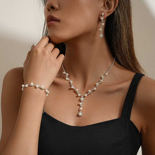 Conjunto de joyas de perlas y diamantes de imitación con temperamento de moda