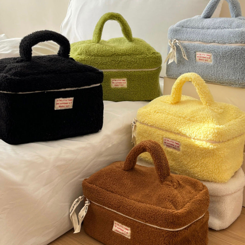 Bolsa de cosméticos de felpa con cremallera de moda para mujer