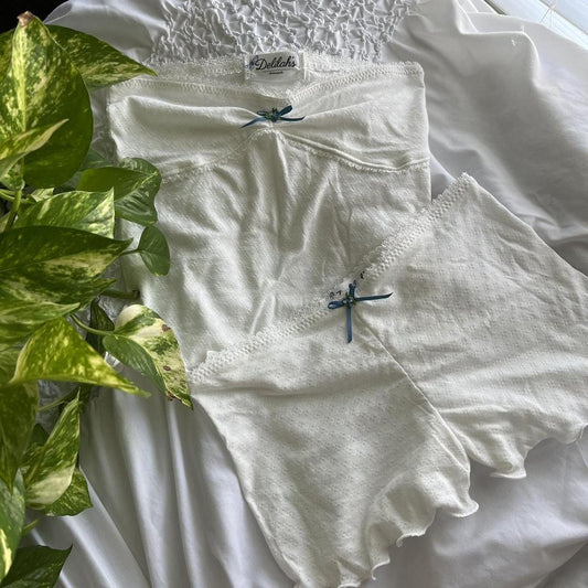Conjunto de top y pantalones cortos de tubo con encaje de color liso a la moda para mujer