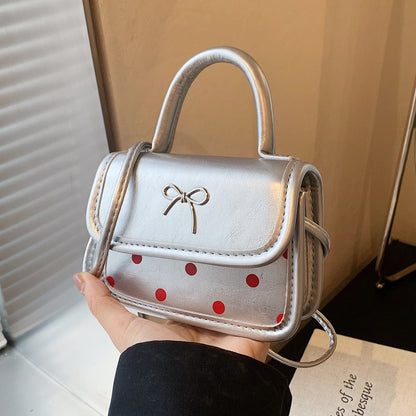 Mini bolso bandolera cuadrado con lazo de moda
