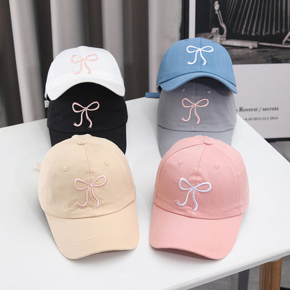 Gorra de béisbol con lazo bordado de color liso para mujer