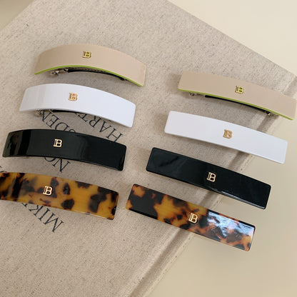 Pinza de resorte rectangular con estampado simple para mujer: accesorio elegante para el cabello