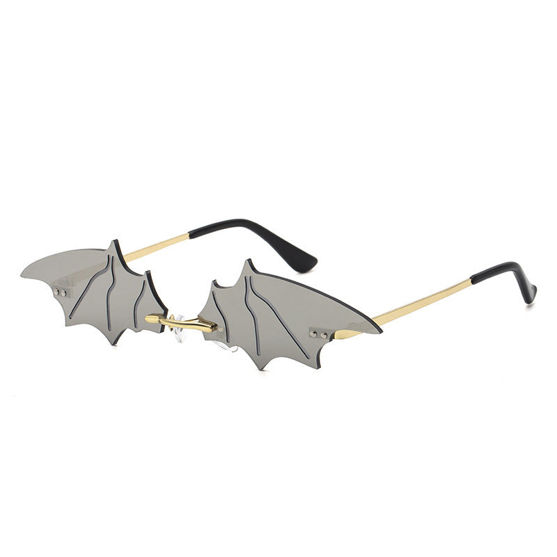 Lunettes de soleil d'Halloween à petite monture en forme de chauve-souris pour femmes