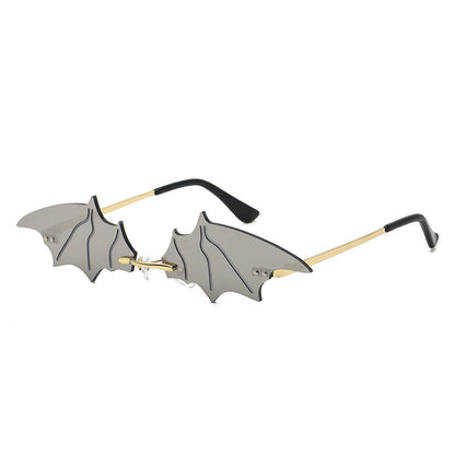 Lunettes de soleil d'Halloween à petite monture en forme de chauve-souris pour femmes