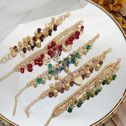 Pulsera bohemia con colgante floral en forma de corazón