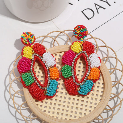 Boucles d'oreilles tressées en perles de riz et fleurs de Bohème