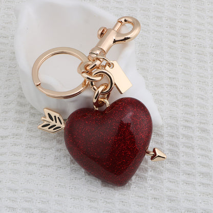 Llavero con colgante de bolso rojo de resina estilo urbano para mujer