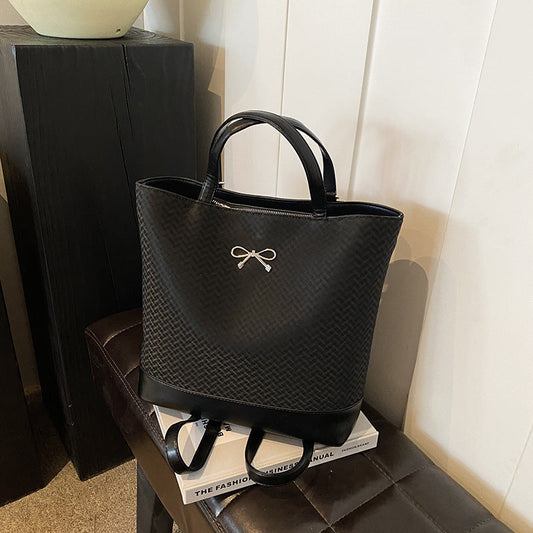 Bolso de mano con hebilla de mariposa de color liso para mujer
