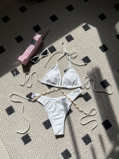 Traje de baño de bikini con cuello halter y cadena de conchas de color sólido sexy a la moda para mujer