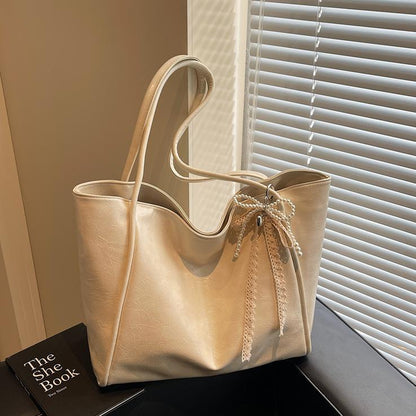 Bolso tote retro de piel encerada con aceite para mujer con colgante de lazo
