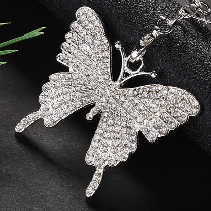 Boucles d'oreilles créoles papillon en strass à la mode exagérée