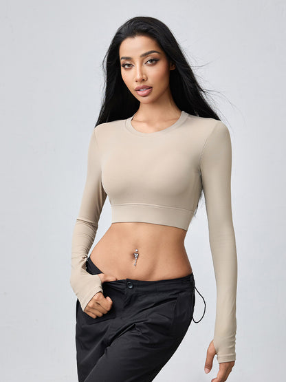 T-shirt de yoga moulant dos nu à manches longues et ajouré