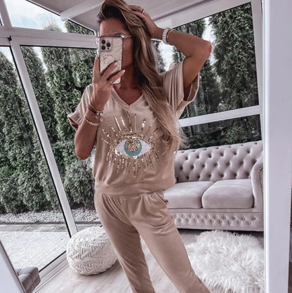 Conjunto de dos piezas con cuello en V y estampado de lentejuelas de ojo de diablo