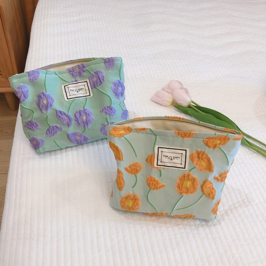 Bolsa de cosméticos con estampado floral de moda