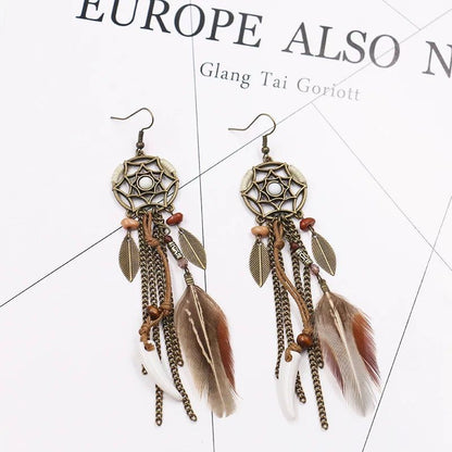 Pendientes bohemios hechos a mano con borlas de plumas huecas