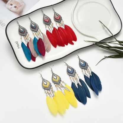 Pendientes bohemios con cuentas de cristal en forma de pétalo hueco para mujer