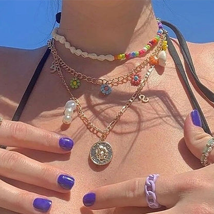 Collar bohemio de perlas multicapa con cuentas de concha