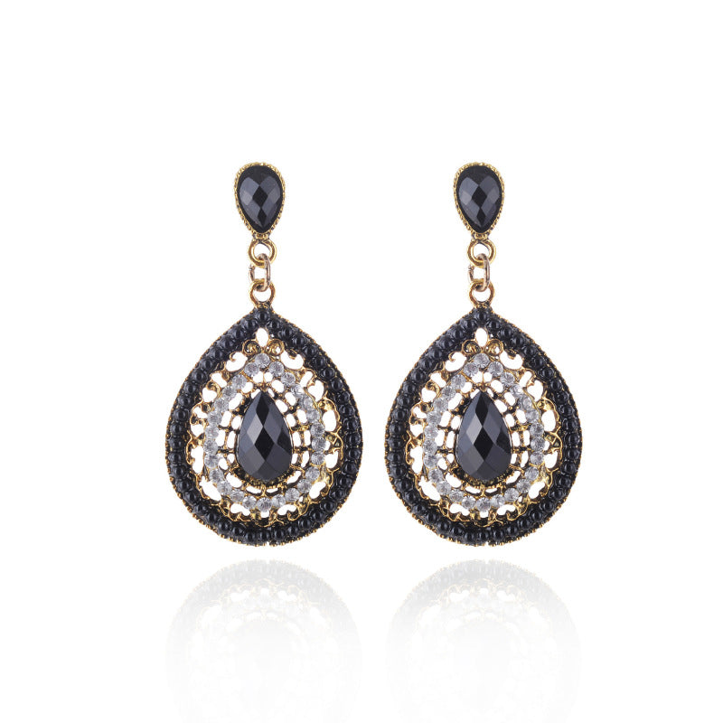 Pendientes colgantes con piedras preciosas huecas de estilo bohemio para mujer