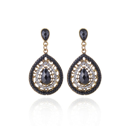 Pendientes colgantes con piedras preciosas huecas de estilo bohemio para mujer