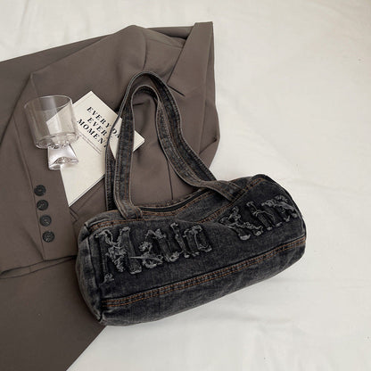 Bolsos de mezclilla con agujeros y bordado de letras vintage