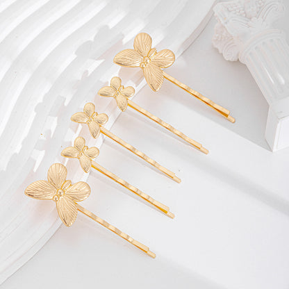 Pince papillon tendance en alliage de zinc