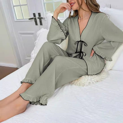 Conjunto de top informal de manga larga con cuello en V y pantalones holgados para mujer