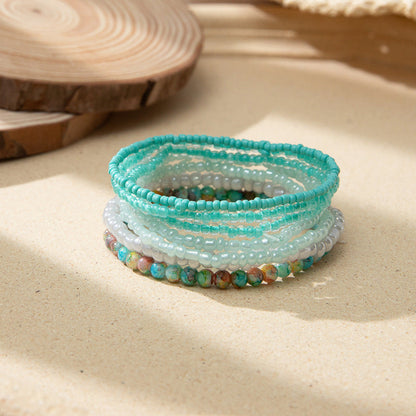 Conjunto de pulseras elásticas de cuentas de arroz multicolor bohemias
