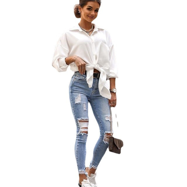 Vaqueros rotos de moda urbana para mujer