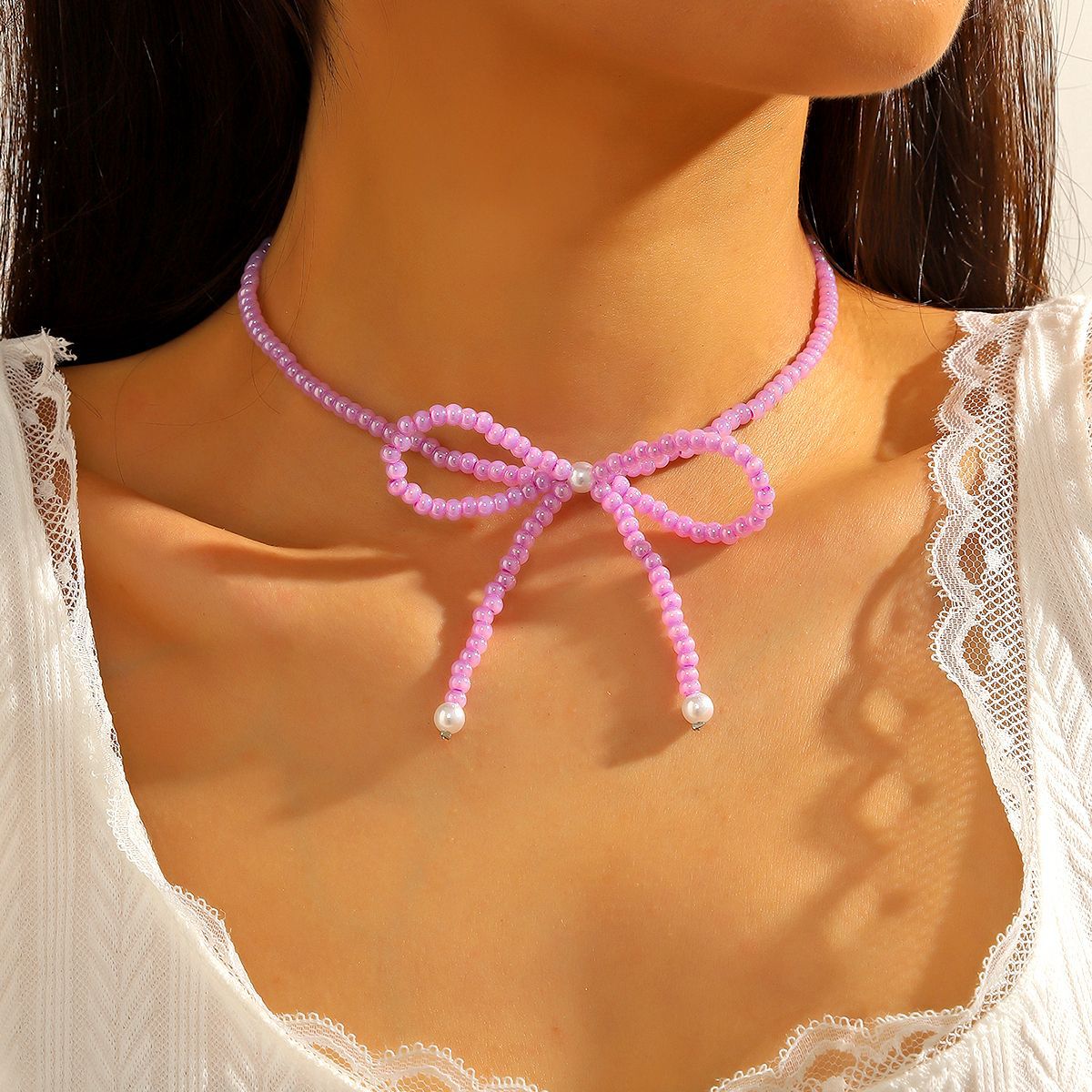 Collar bohemio con cuentas de arroz y lazo para mujer